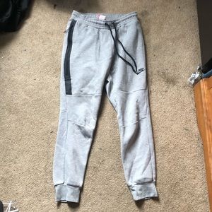 Grey Nike sweatpants.